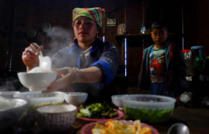 Hmong girl cooks lunch