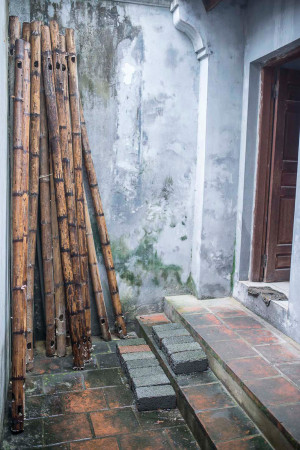 Hanoi street photography bamboo poles